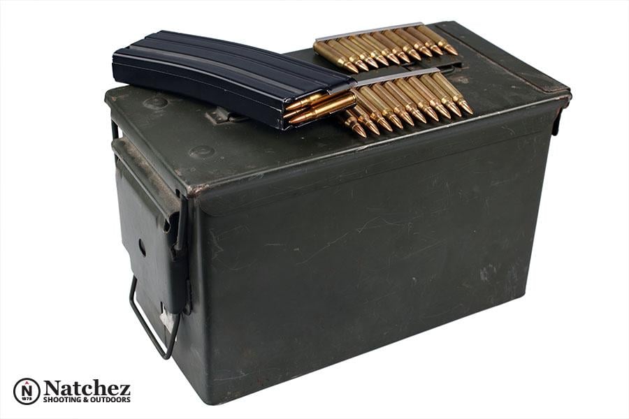 An ammunition box with strips and a magazine on its lid?